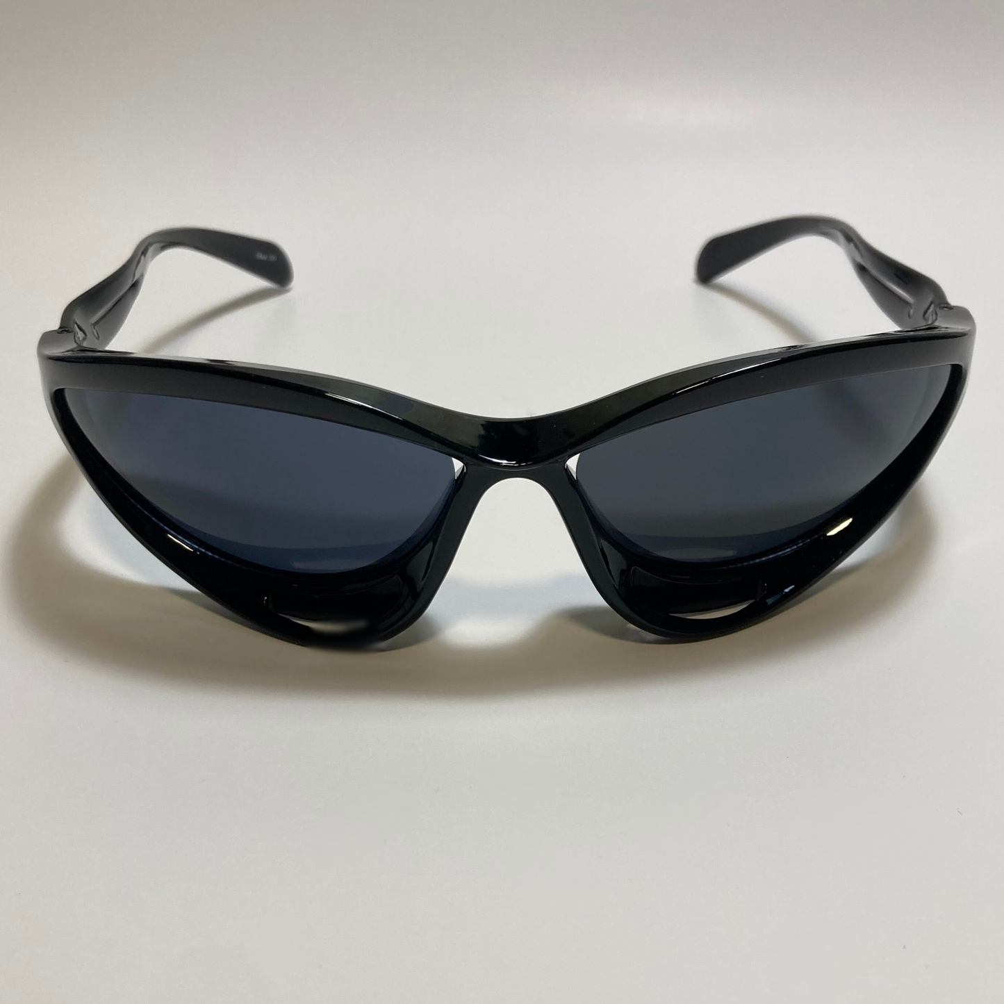 mens and womens gloss black and black lens futuristic sunglasses