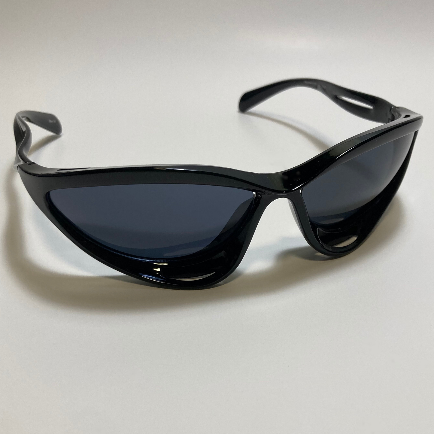 mens and womens gloss black and black lens futuristic sunglasses