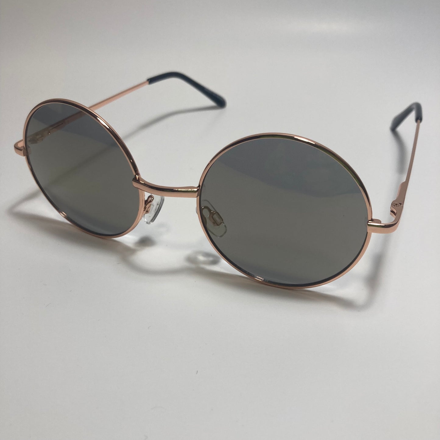 mens and womens gold and black round sunglasses
