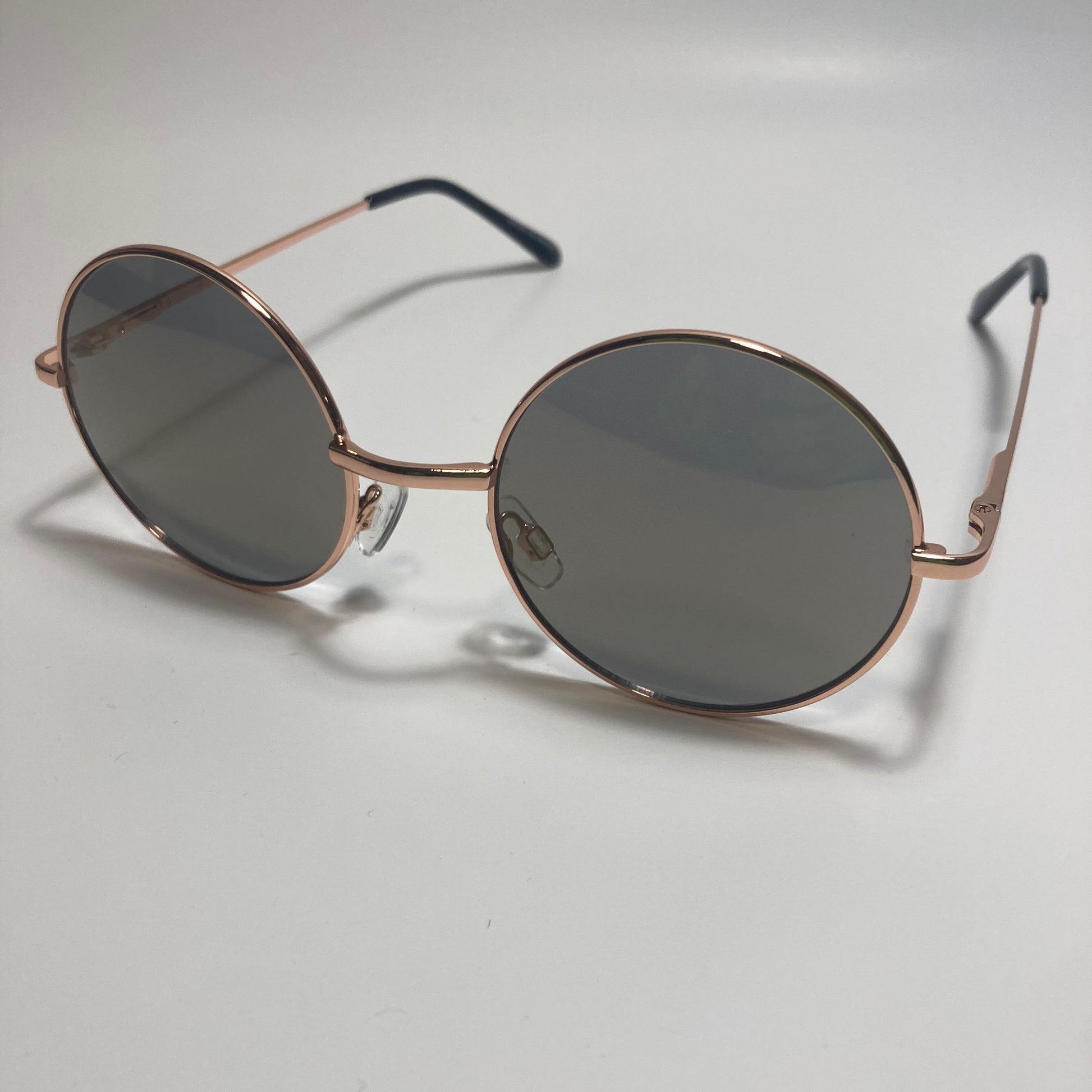 mens and womens gold and black round sunglasses