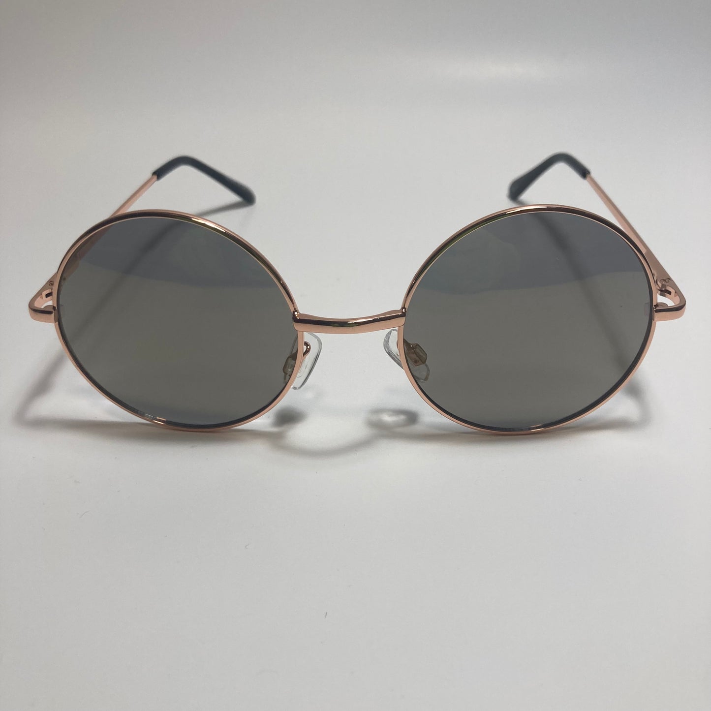 mens and womens gold and black round sunglasses