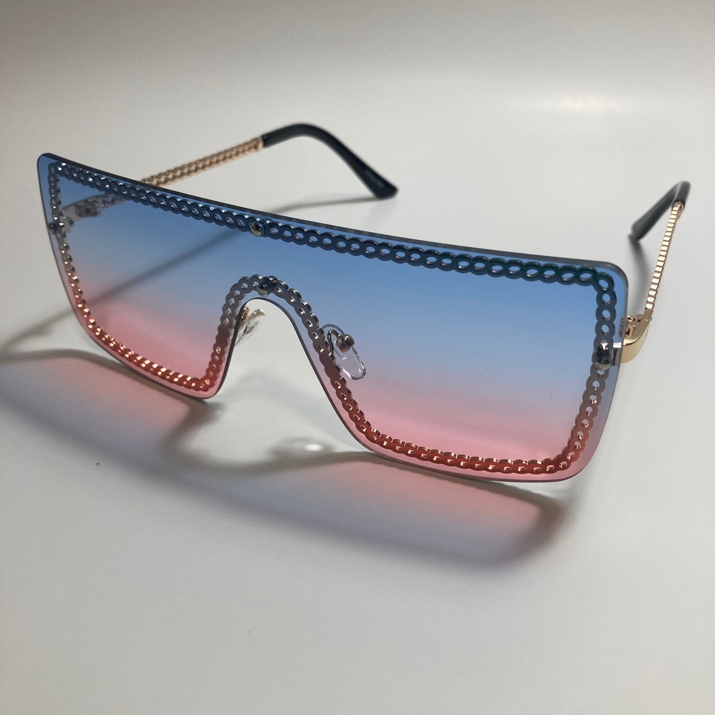 womens gold pink and blue shield sunglasses