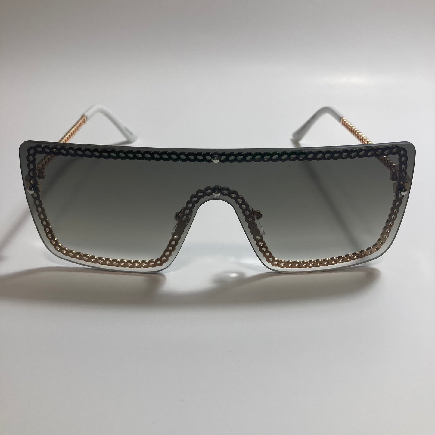 womens gold and green shield sunglasses