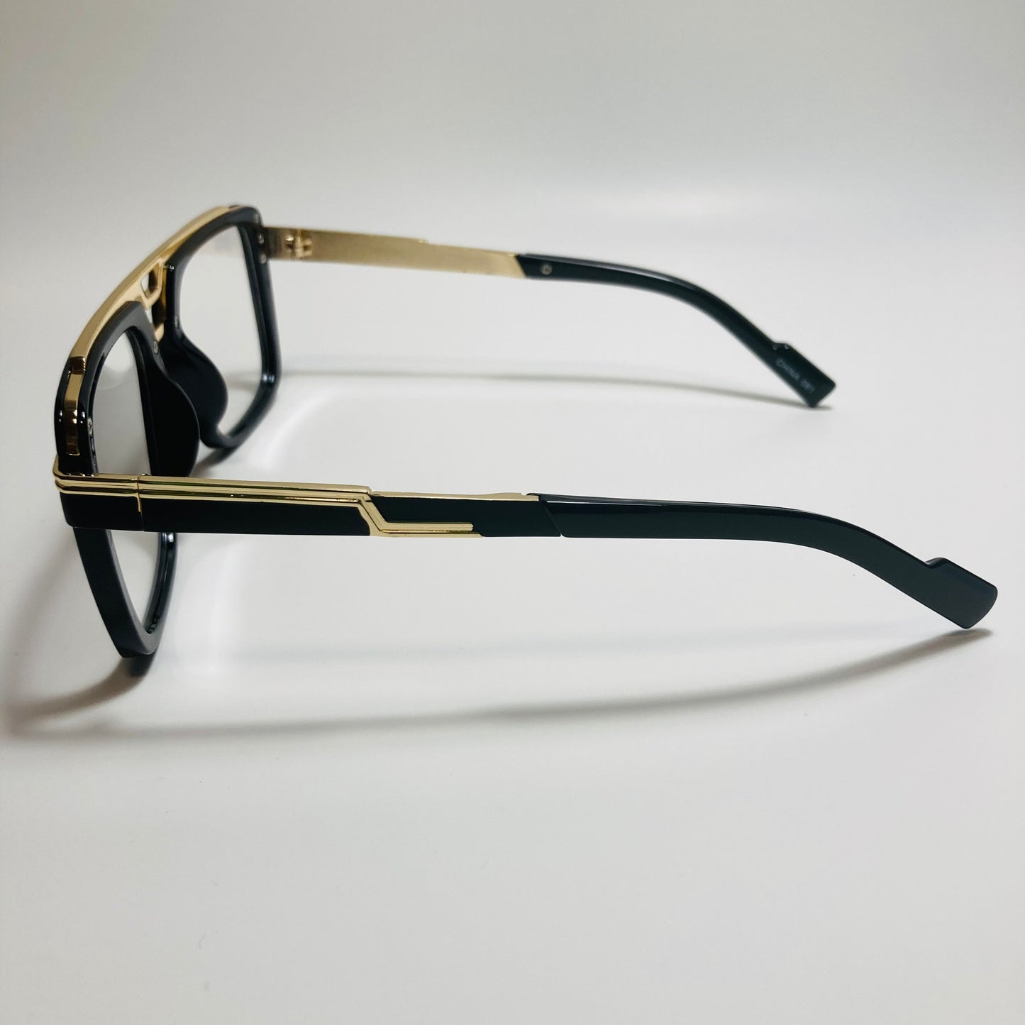 mens and womens black and gold gazelle glasses