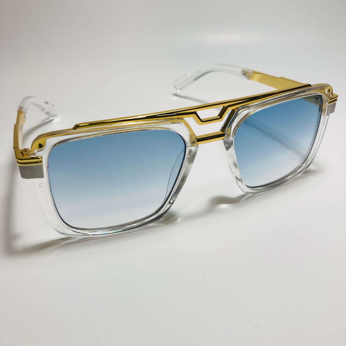 mens and womens clear gold and blue gazelle sunglasses