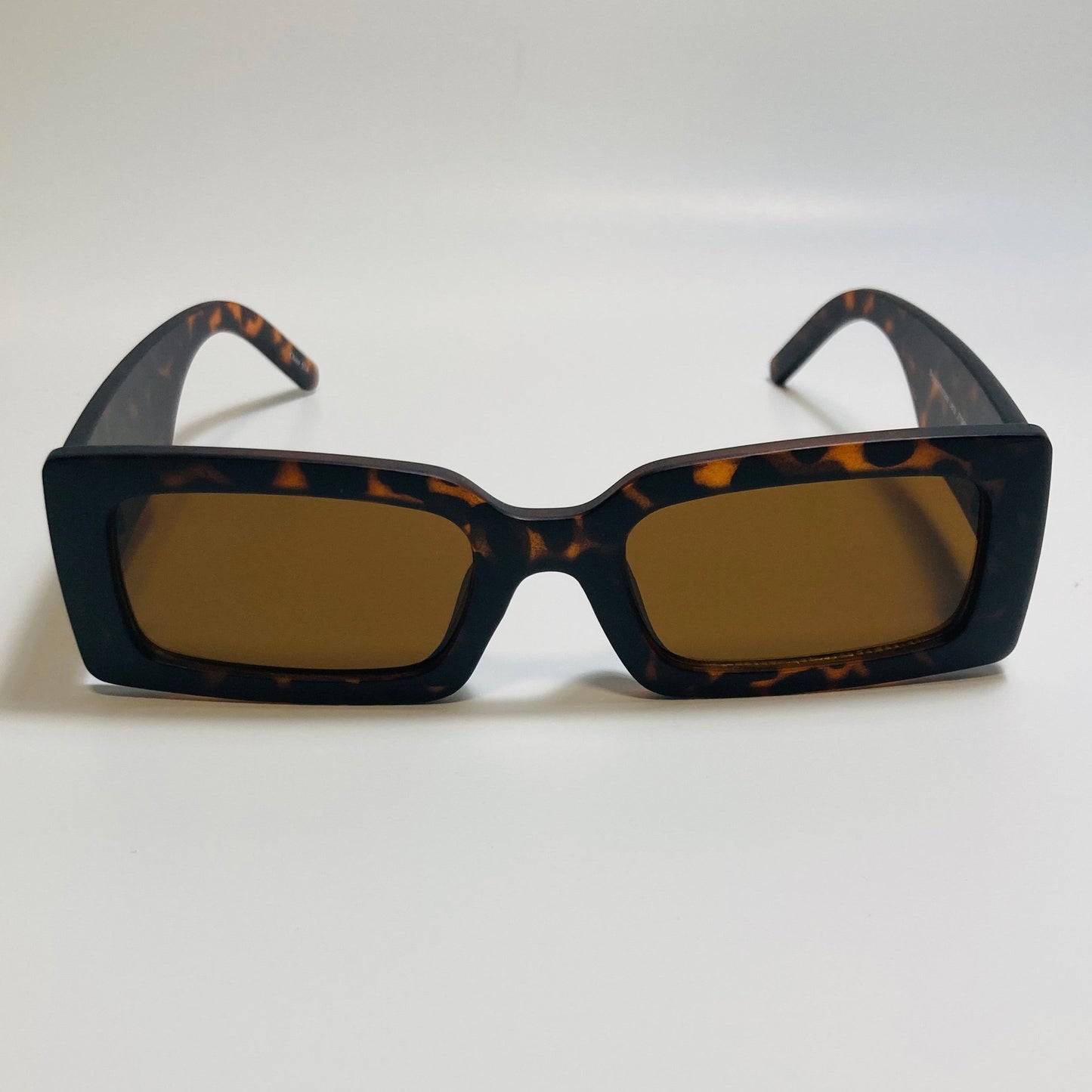 mens and womens brown rectangle sunglasses