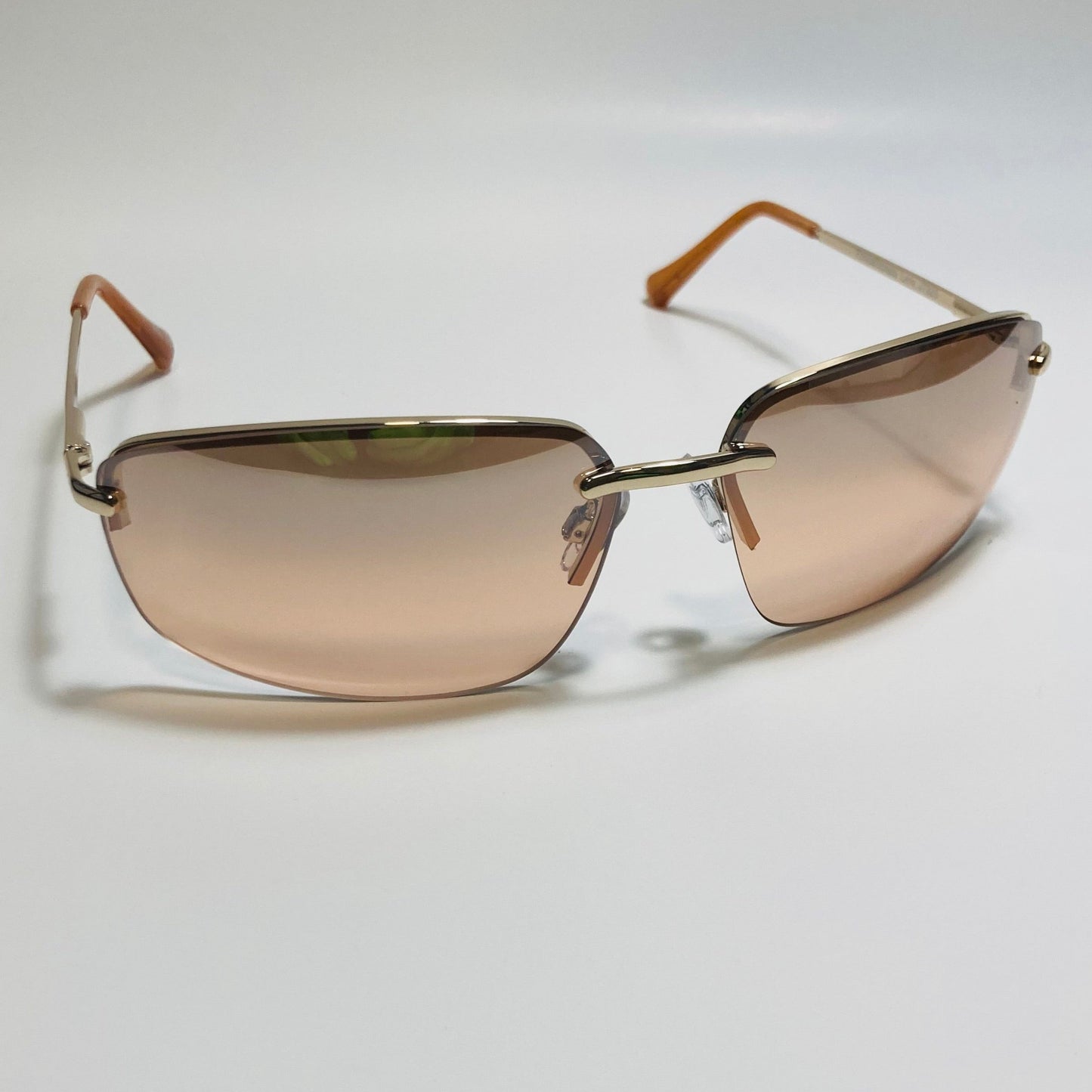 mens and womens gold and brown half rim wrap 2000s sunglasses