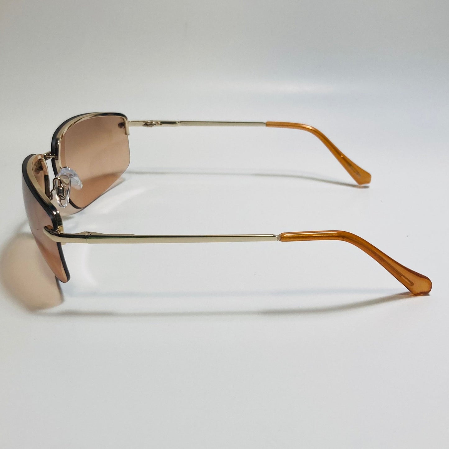 mens and womens gold and brown half rim wrap 2000s sunglasses