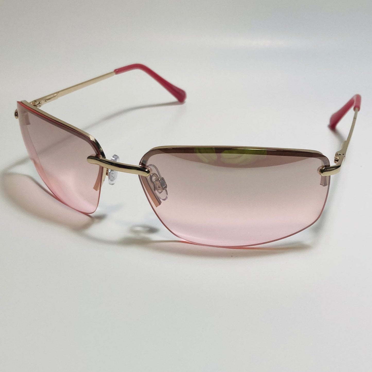 mens and womens gold and pink half rim wrap 2000s sunglasses