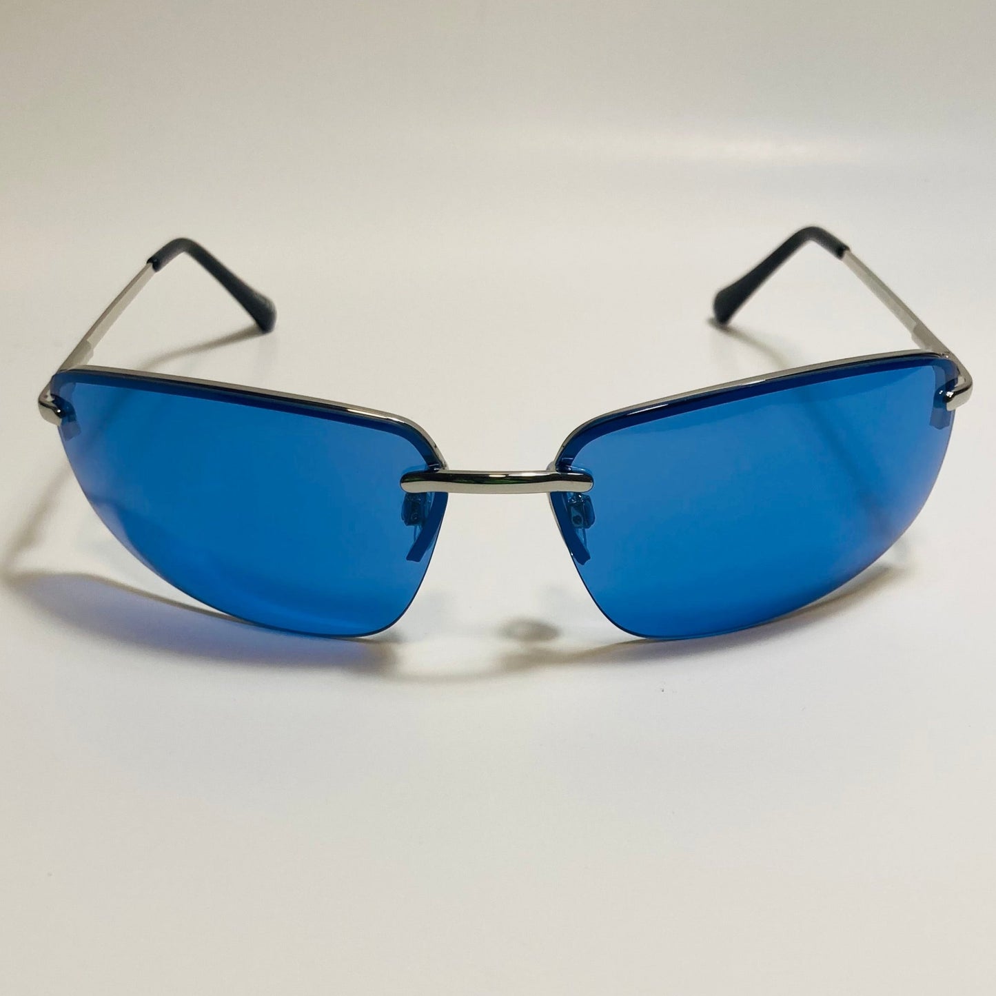 mens and womens silver and blue half rim wrap 2000s sunglasses