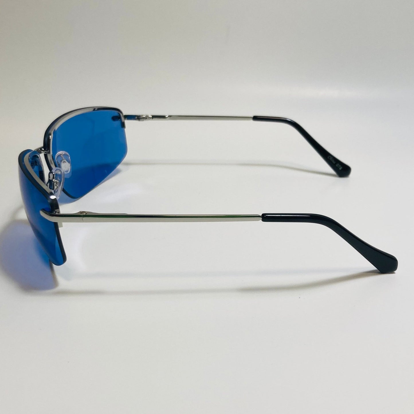 mens and womens silver and blue half rim wrap 2000s sunglasses