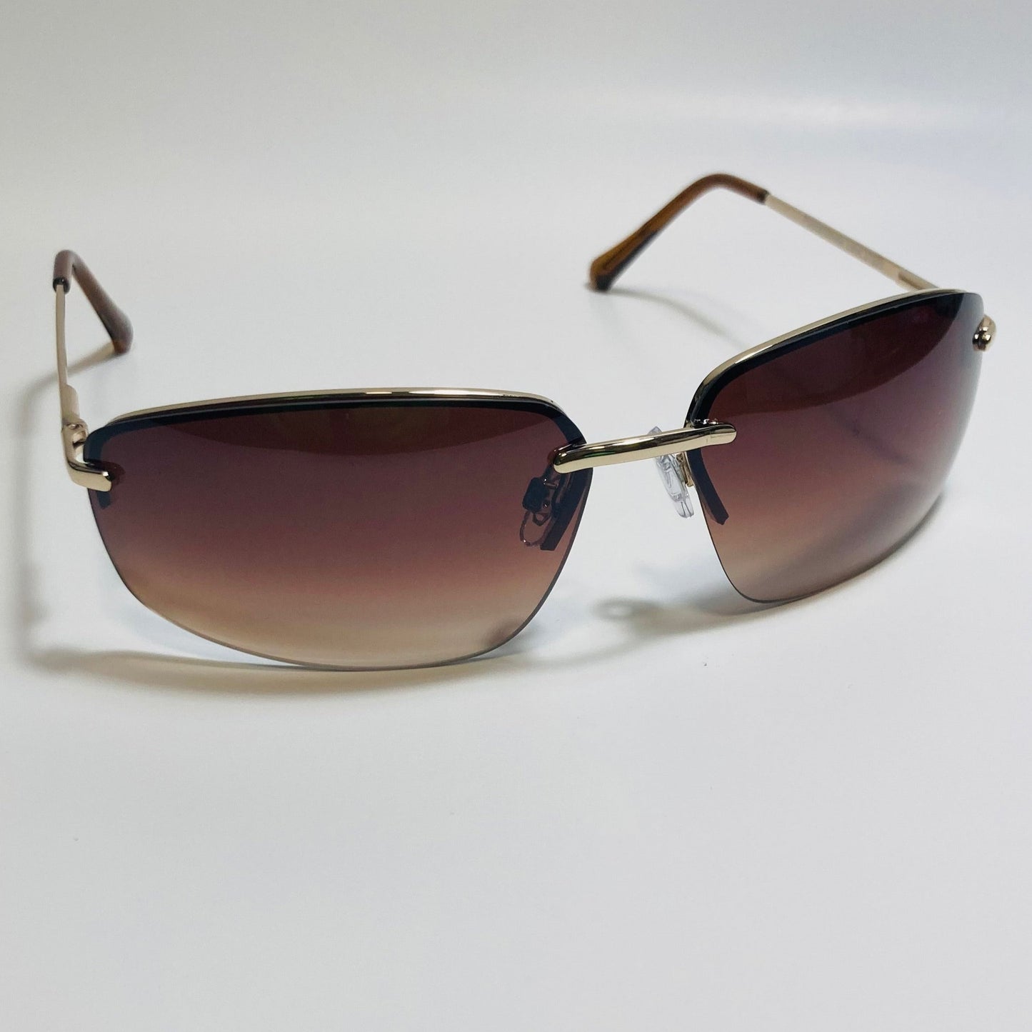 mens and womens gold and brown half rim wrap 2000s sunglasses