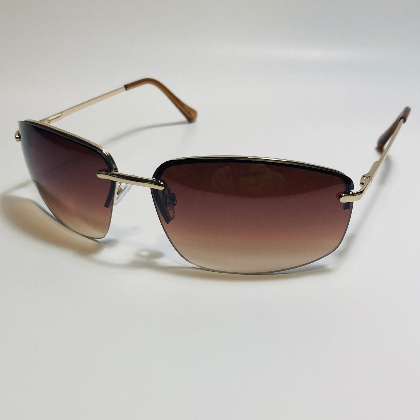 mens and womens gold and brown half rim wrap 2000s sunglasses