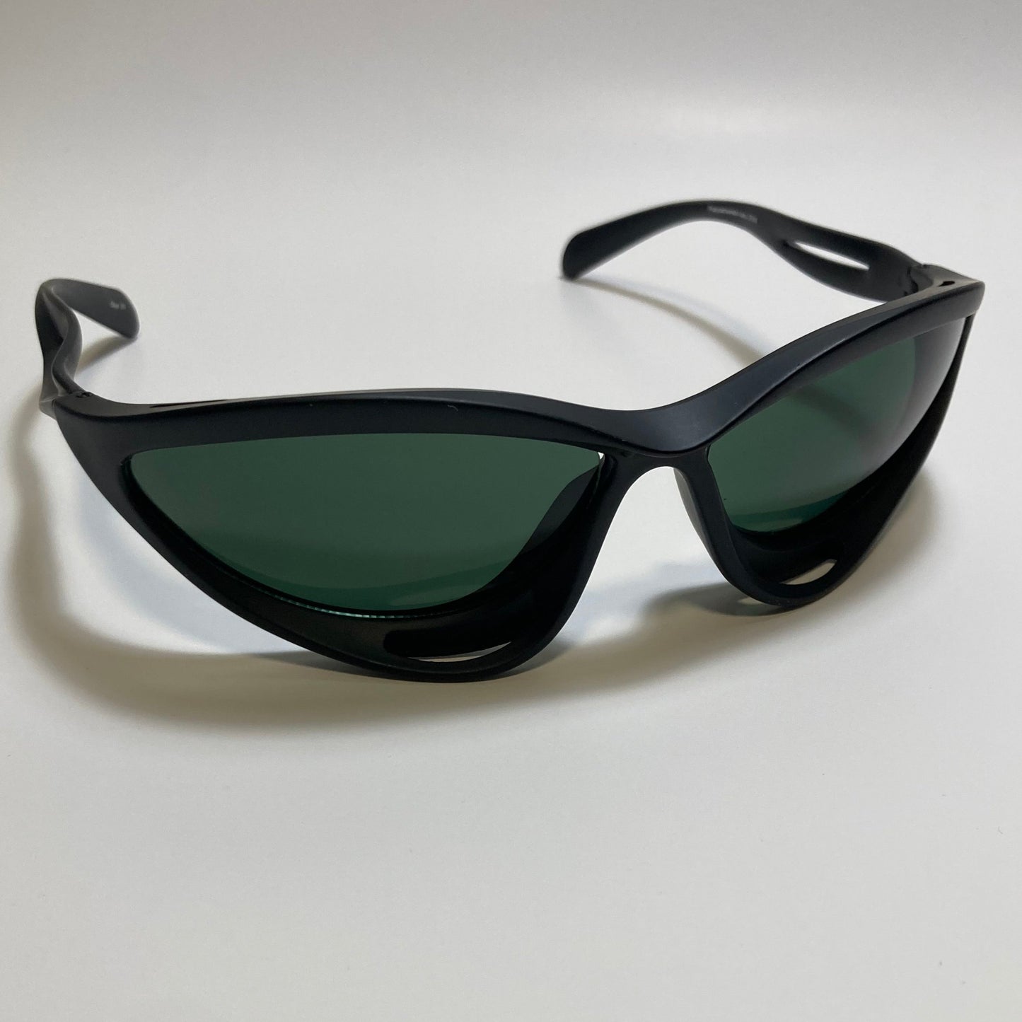mens and womens matte black and green lens futuristic sunglasses