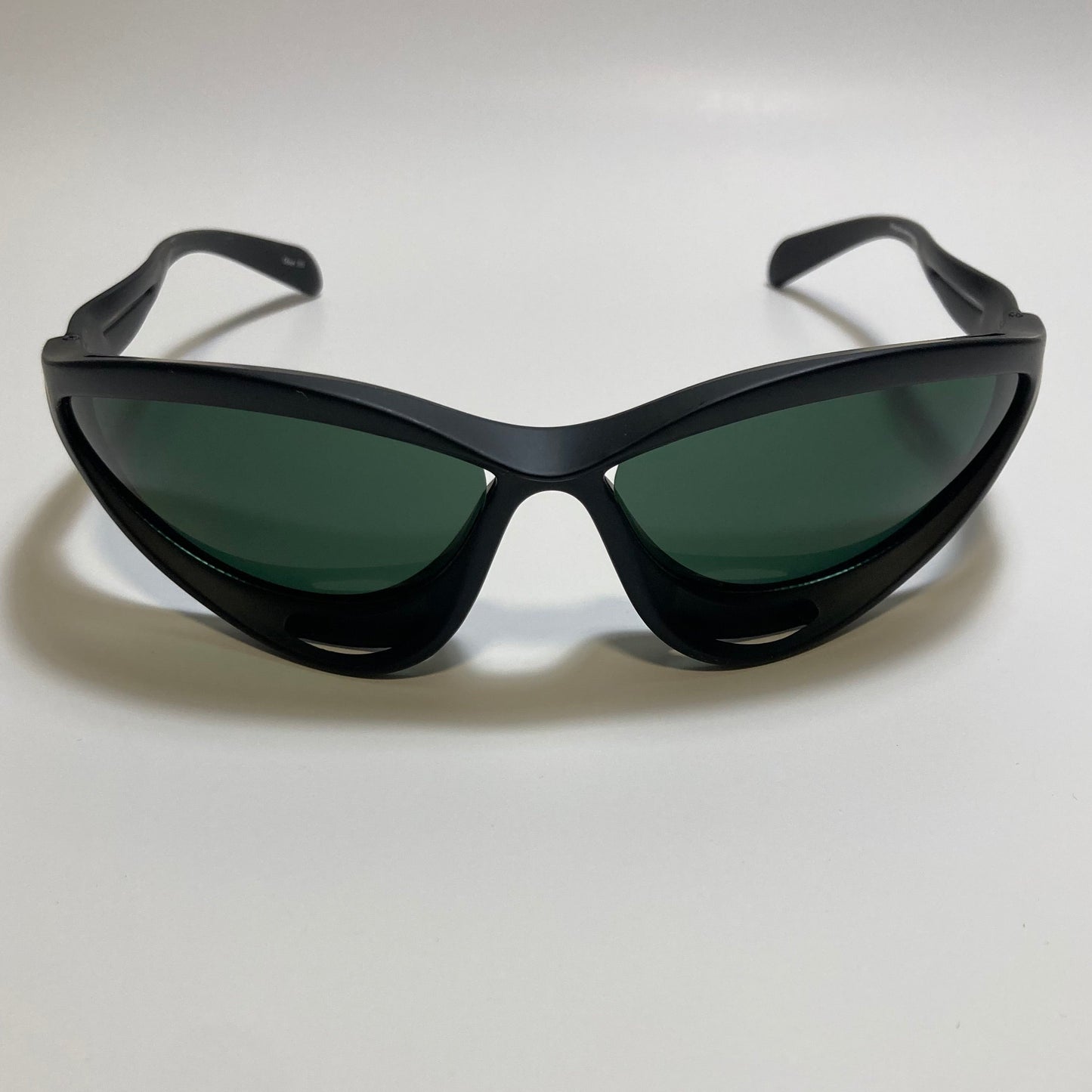 mens and womens matte black and green lens futuristic sunglasses