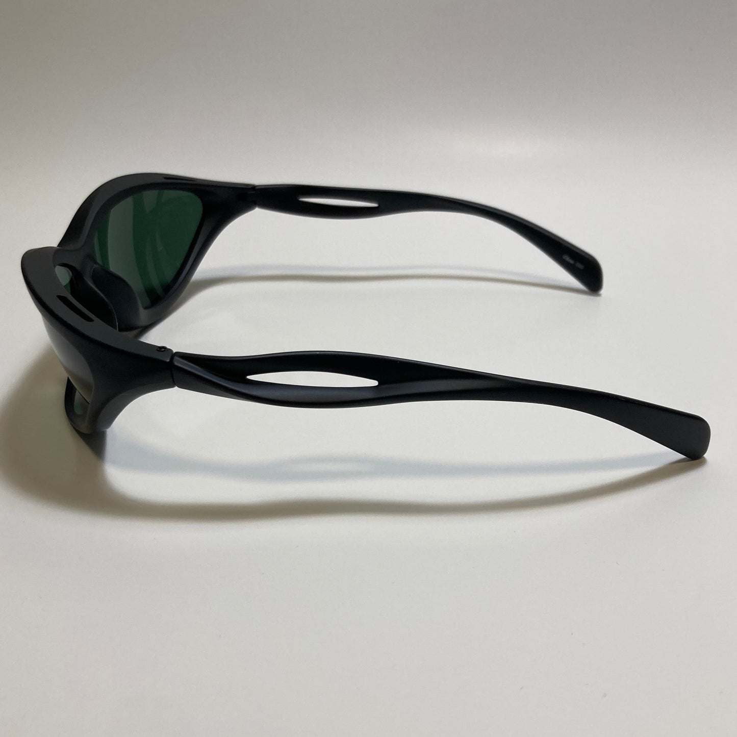 mens and womens matte black and green lens futuristic sunglasses