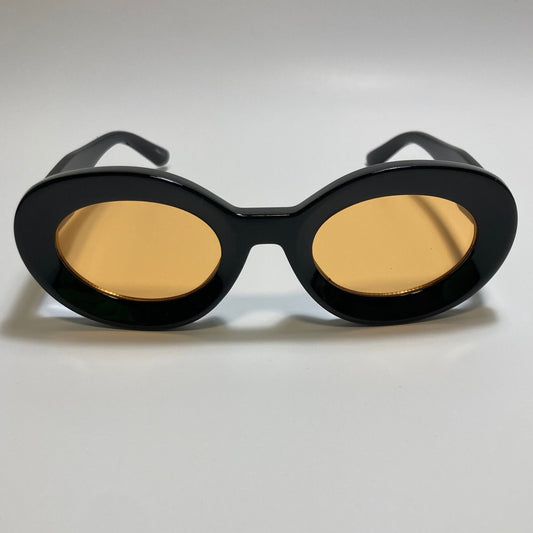 black and yellow round womens MCM sunglasses with chunky frame