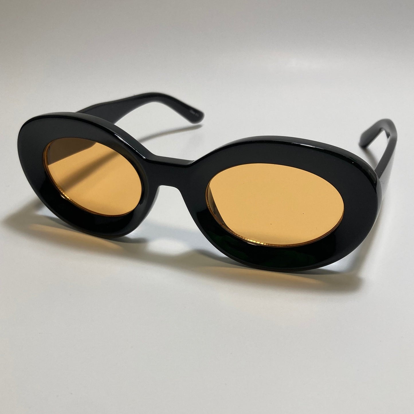 black and yellow round womens MCM sunglasses with chunky frame