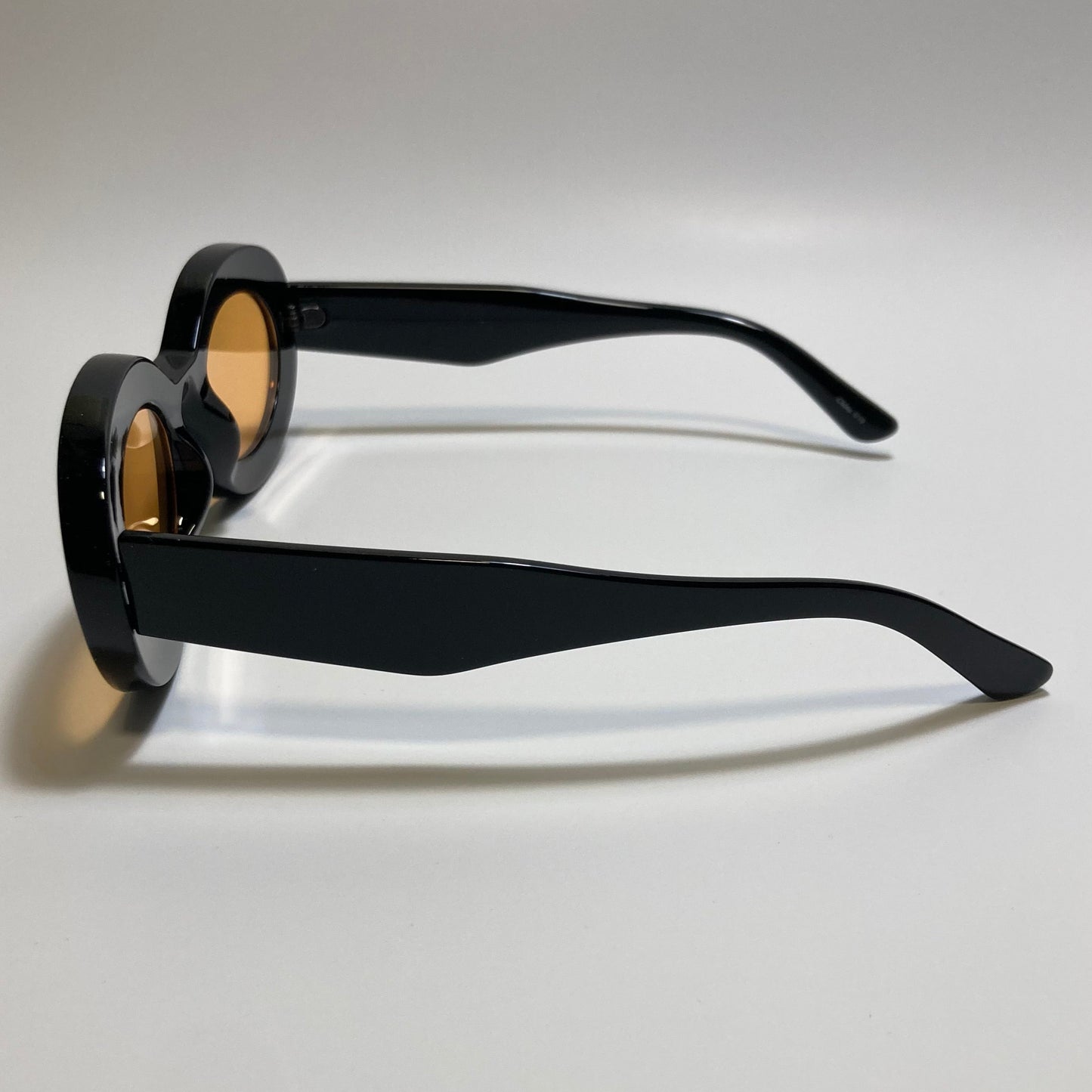 black and yellow round womens MCM sunglasses with chunky frame
