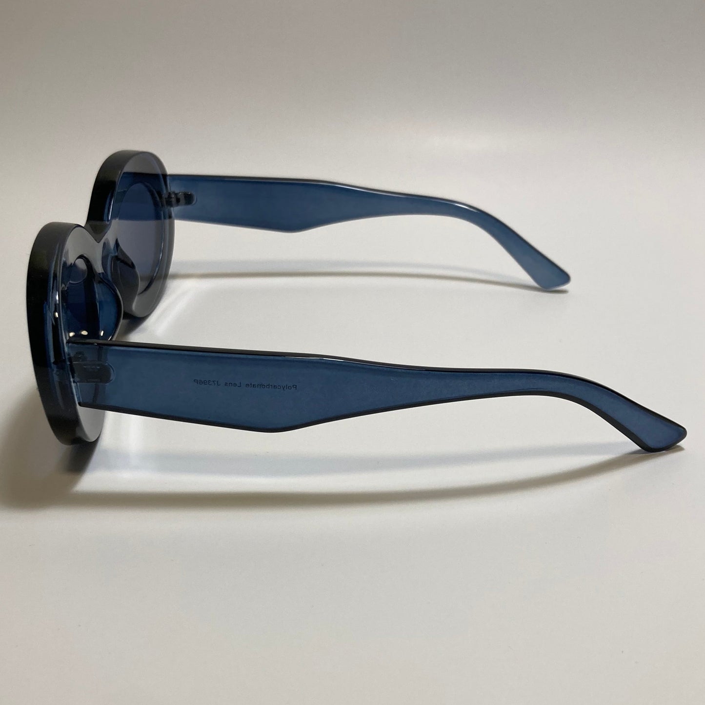 clear blue round womens MCM sunglasses with chunky frame