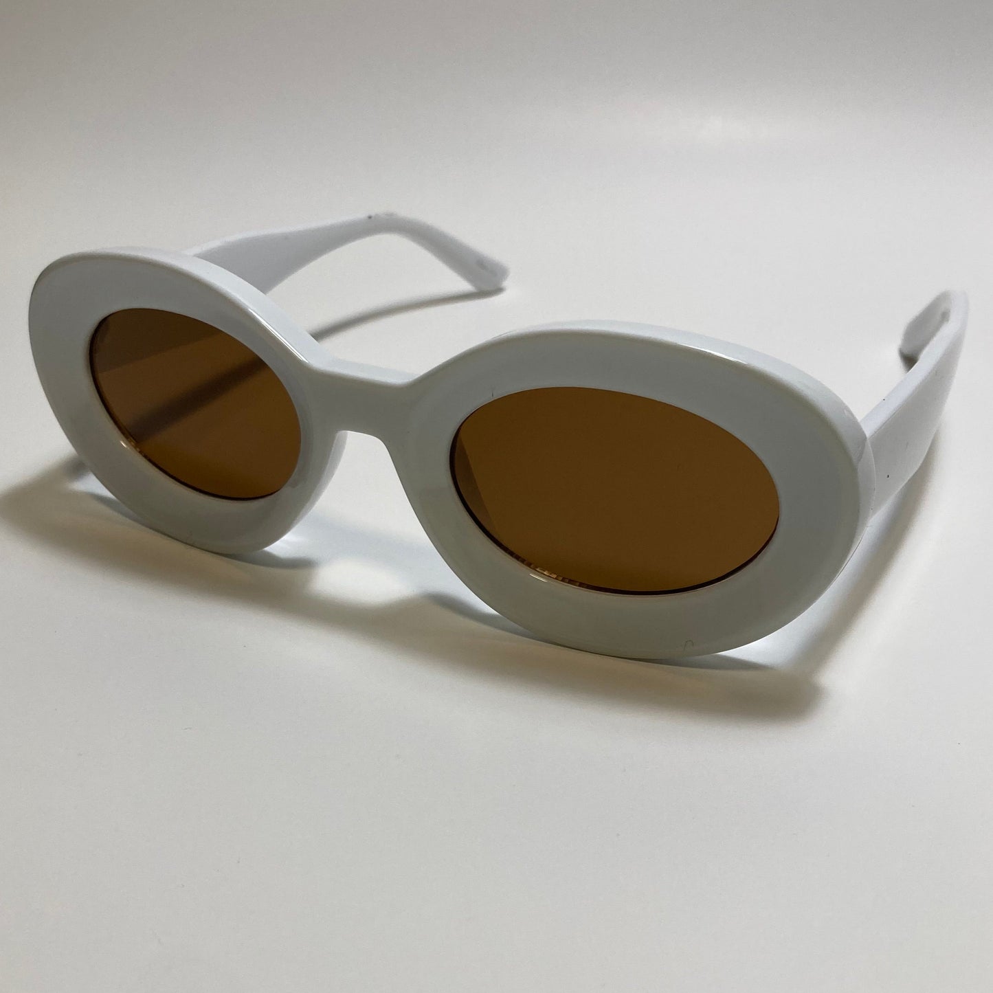 white frame brown lens round womens MCM sunglasses with chunky frame