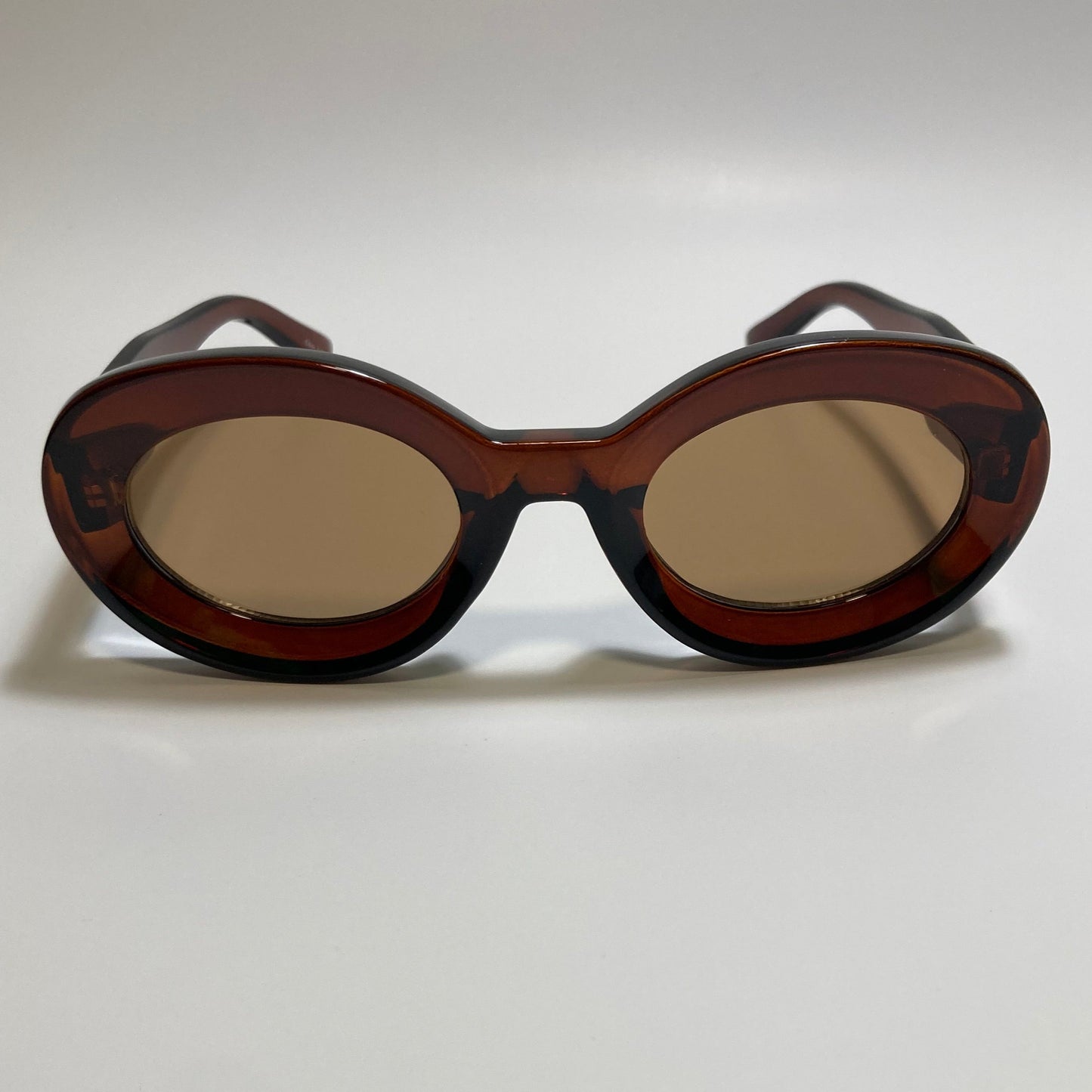 clear brown round womens MCM sunglasses with chunky frame
