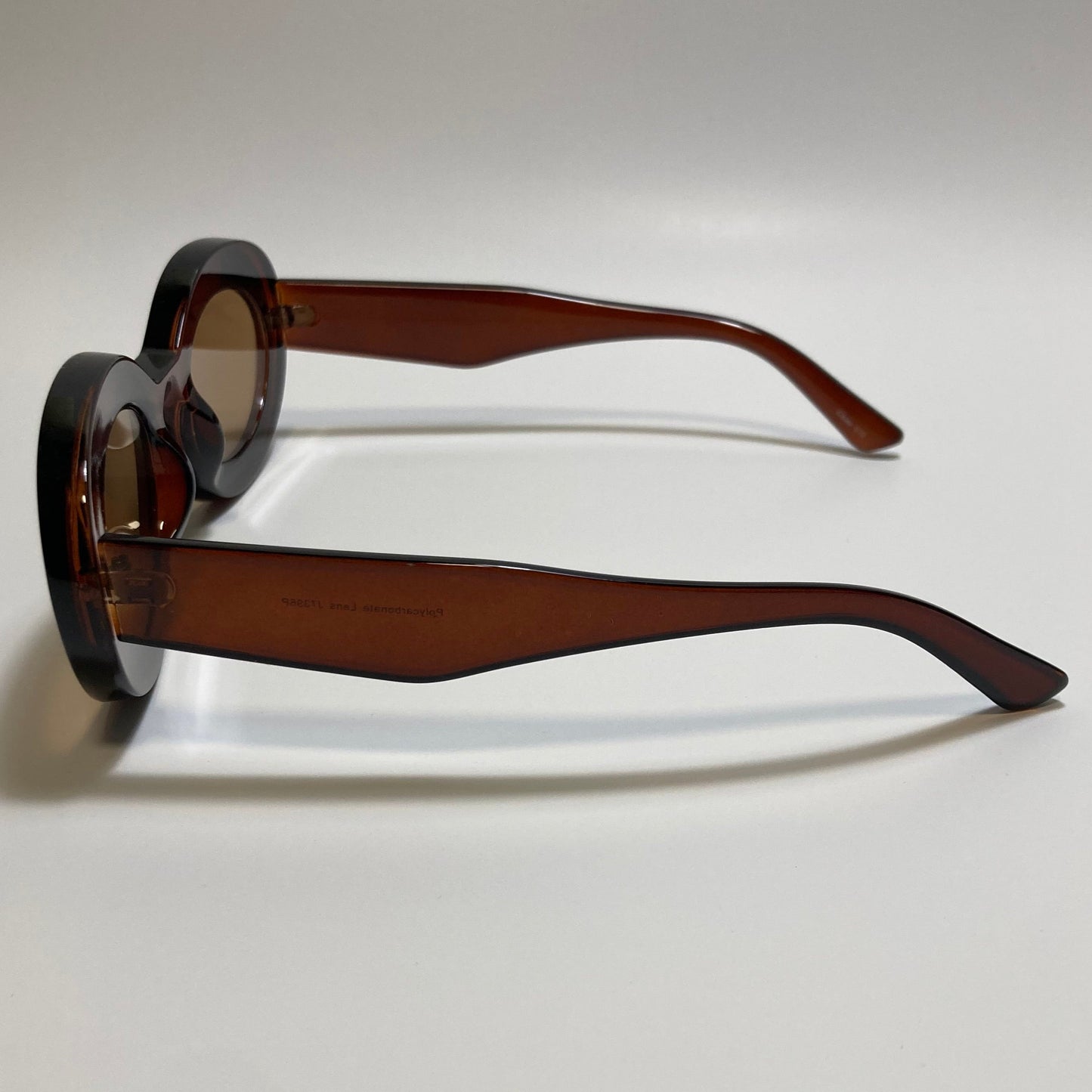 clear brown round womens MCM sunglasses with chunky frame