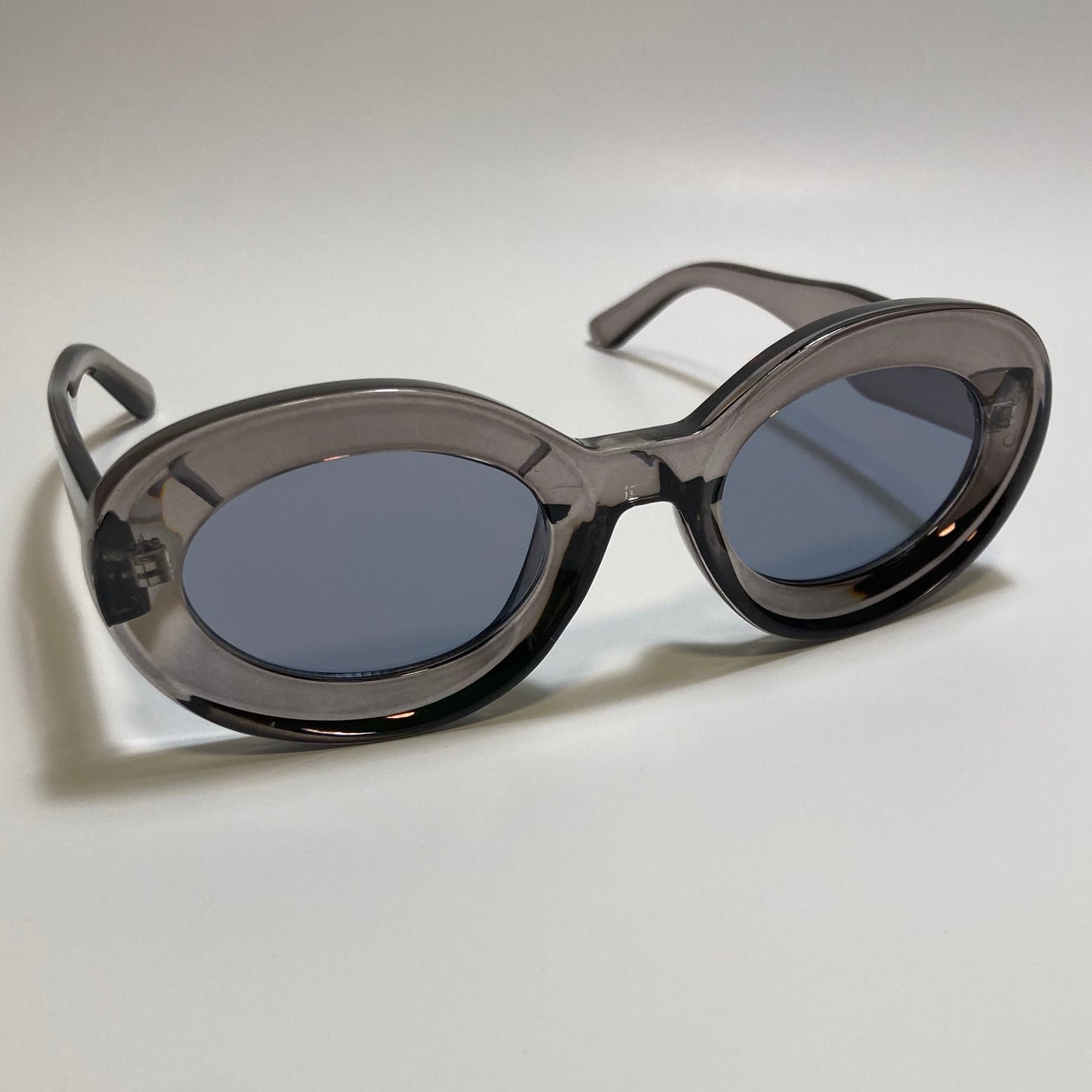 clear gray round womens MCM sunglasses with chunky frame