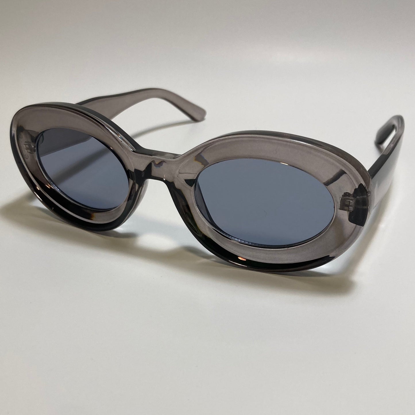 clear gray round womens MCM sunglasses with chunky frame