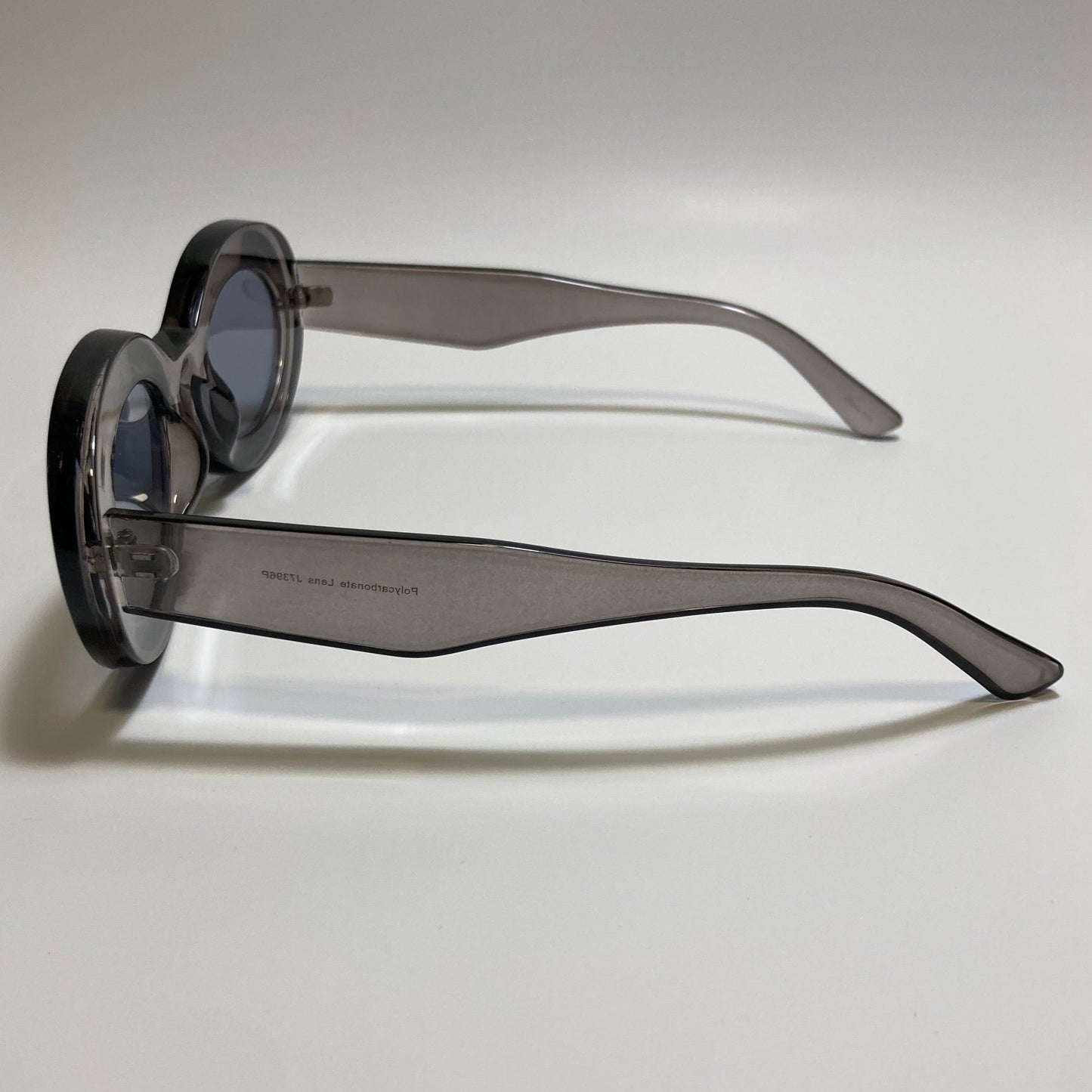 clear gray round womens MCM sunglasses with chunky frame