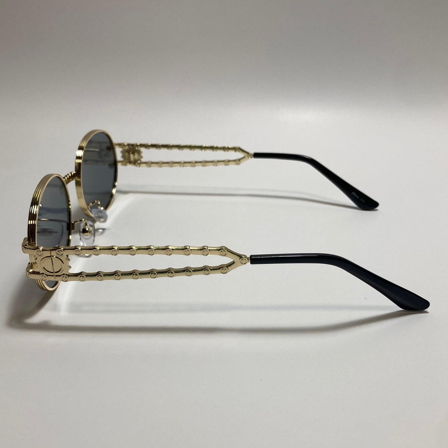 gold and gray mens and womens round sunglasses