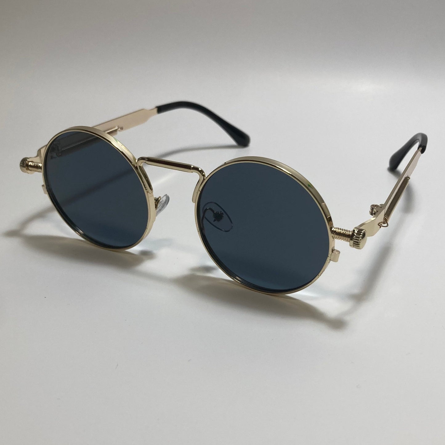 mens and womens gold and black round metal steampunk sunglasses