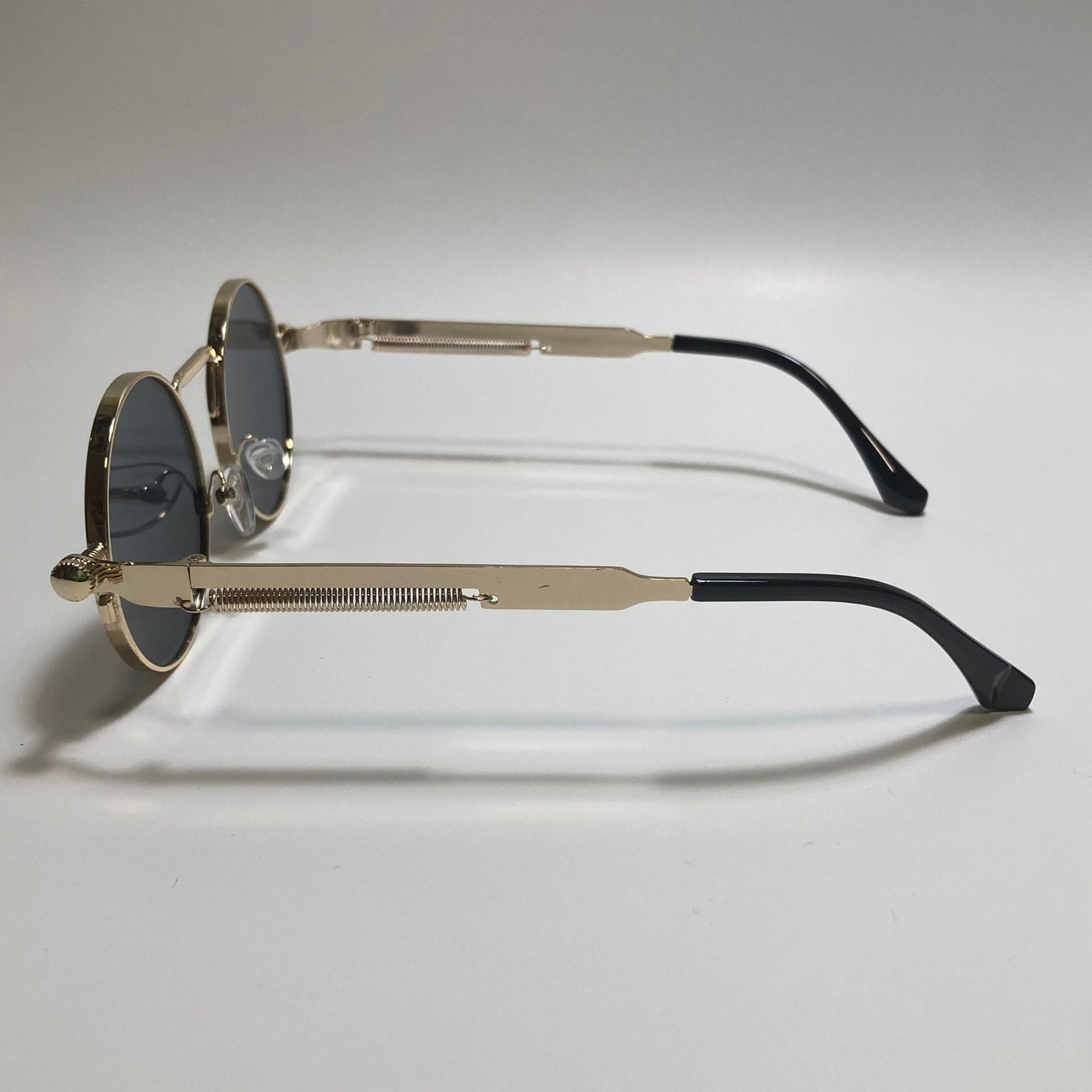 mens and womens gold and black round metal steampunk sunglasses