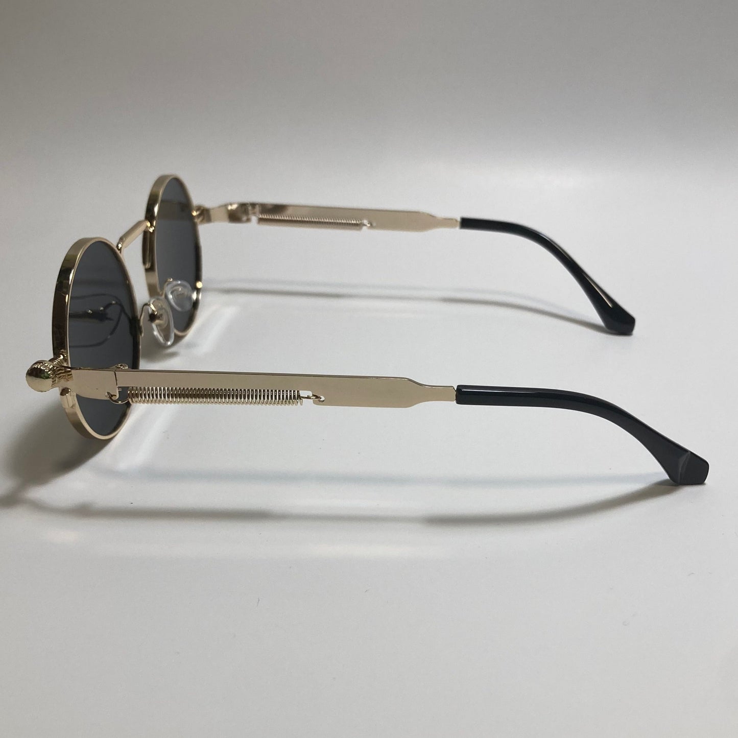 mens and womens gold and gray round metal steampunk sunglasses