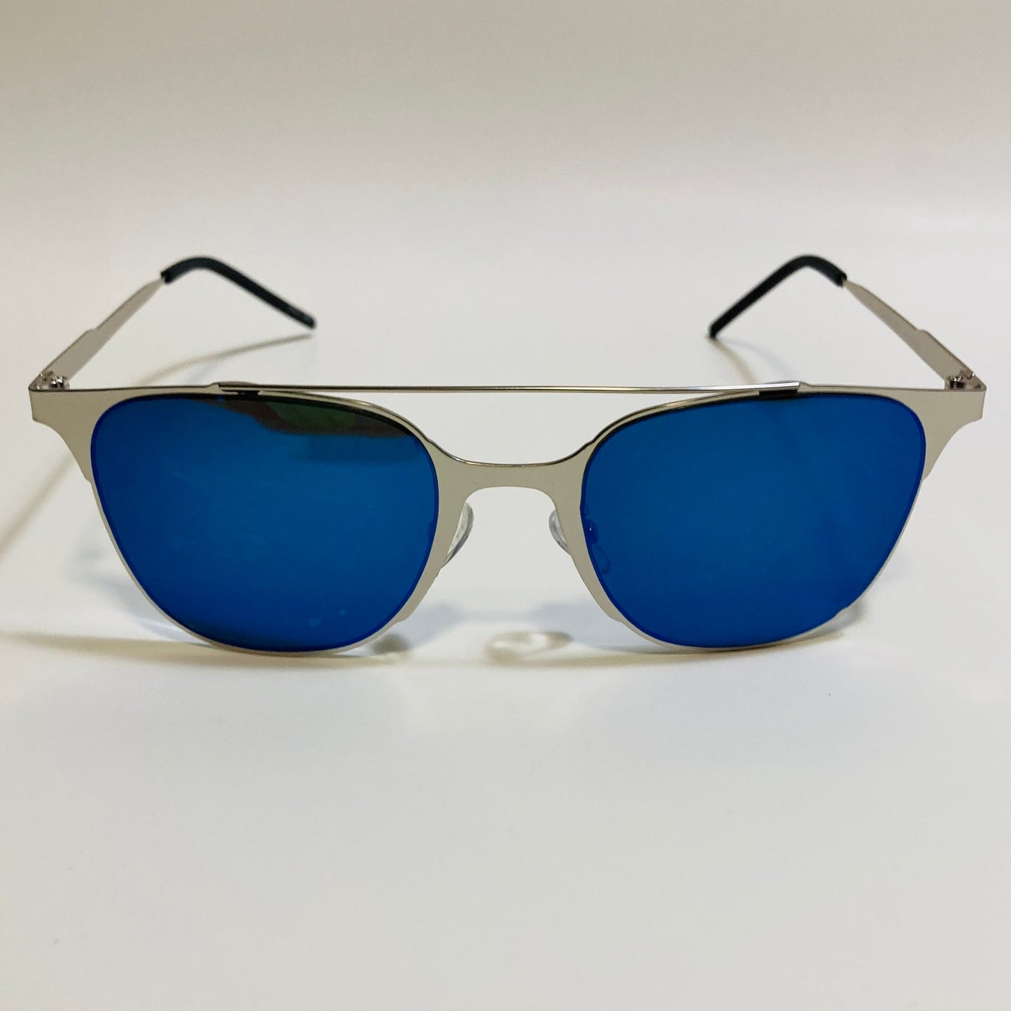 Square silver crossbar sunglasses with mirrored blue lenses