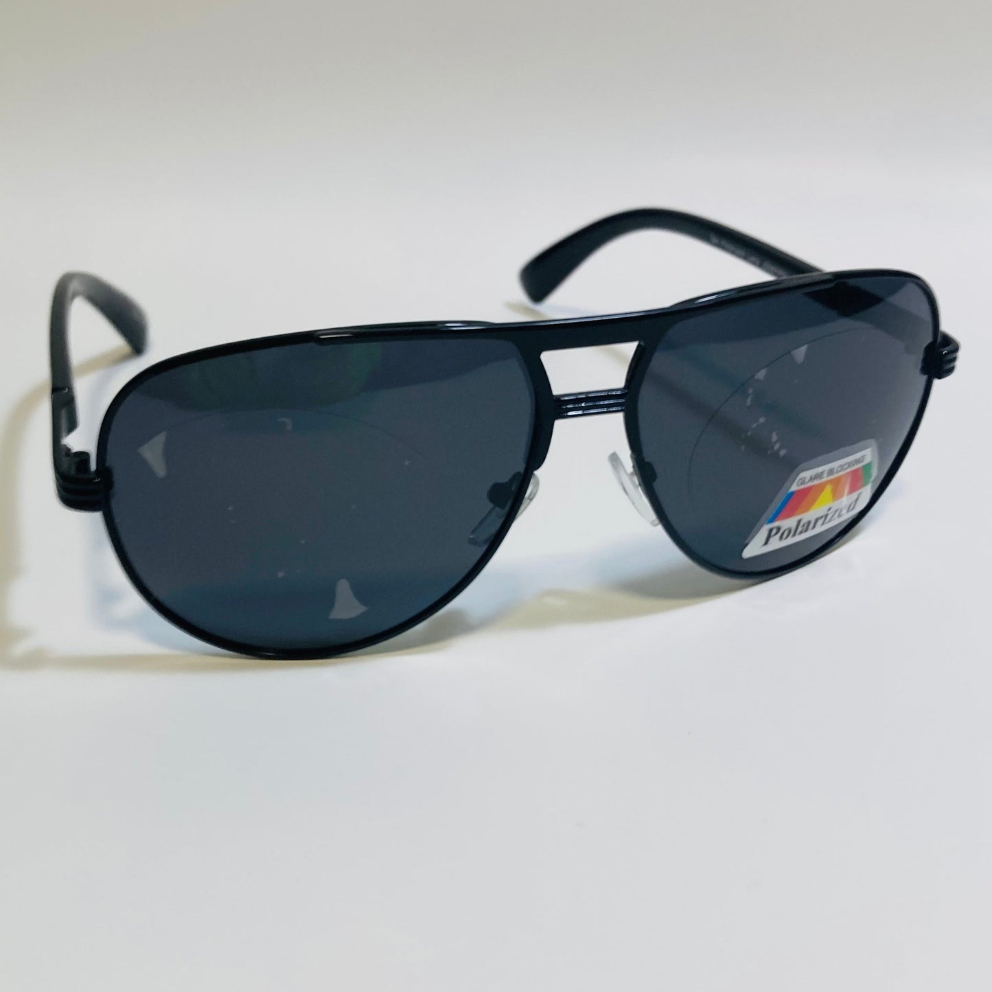 Polarized black aviator sunglasses with engraved metal frame