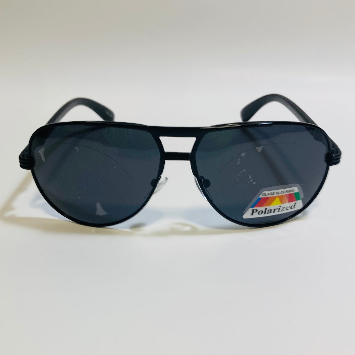 Polarized black aviator sunglasses with engraved metal frame