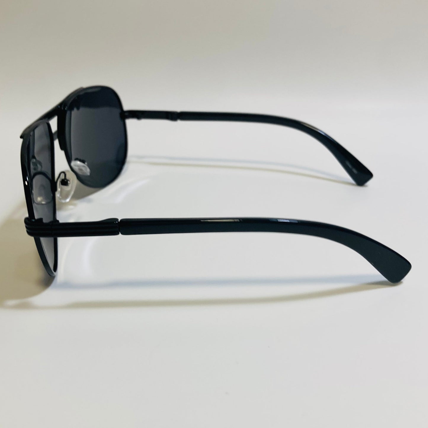 Polarized black aviator sunglasses with engraved metal frame