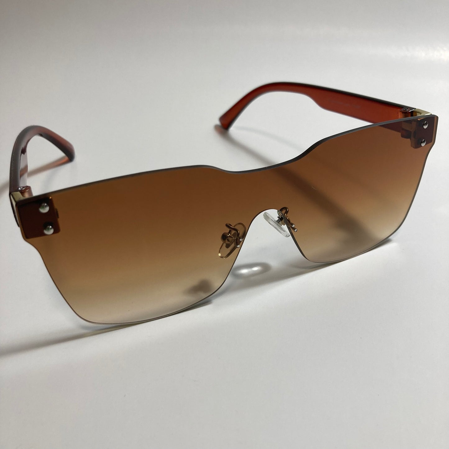 brown rimless square womens sunglasses