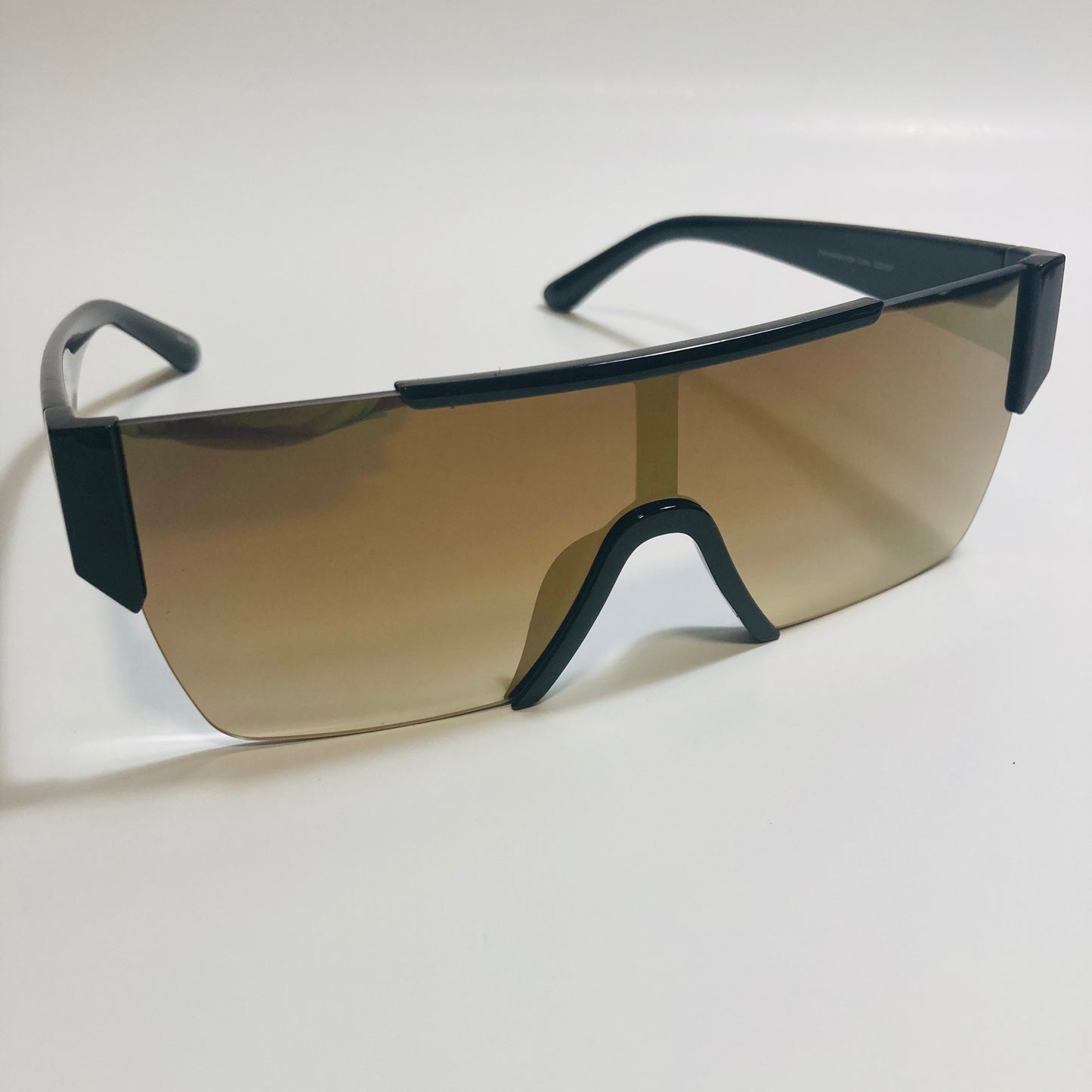 womens and mens black and brown half rim square sunglasses