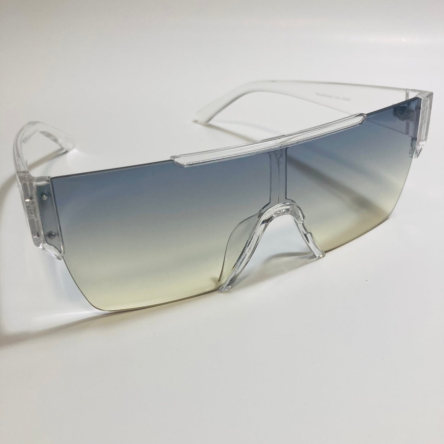 womens and mens clear and blue half rim square sunglasses
