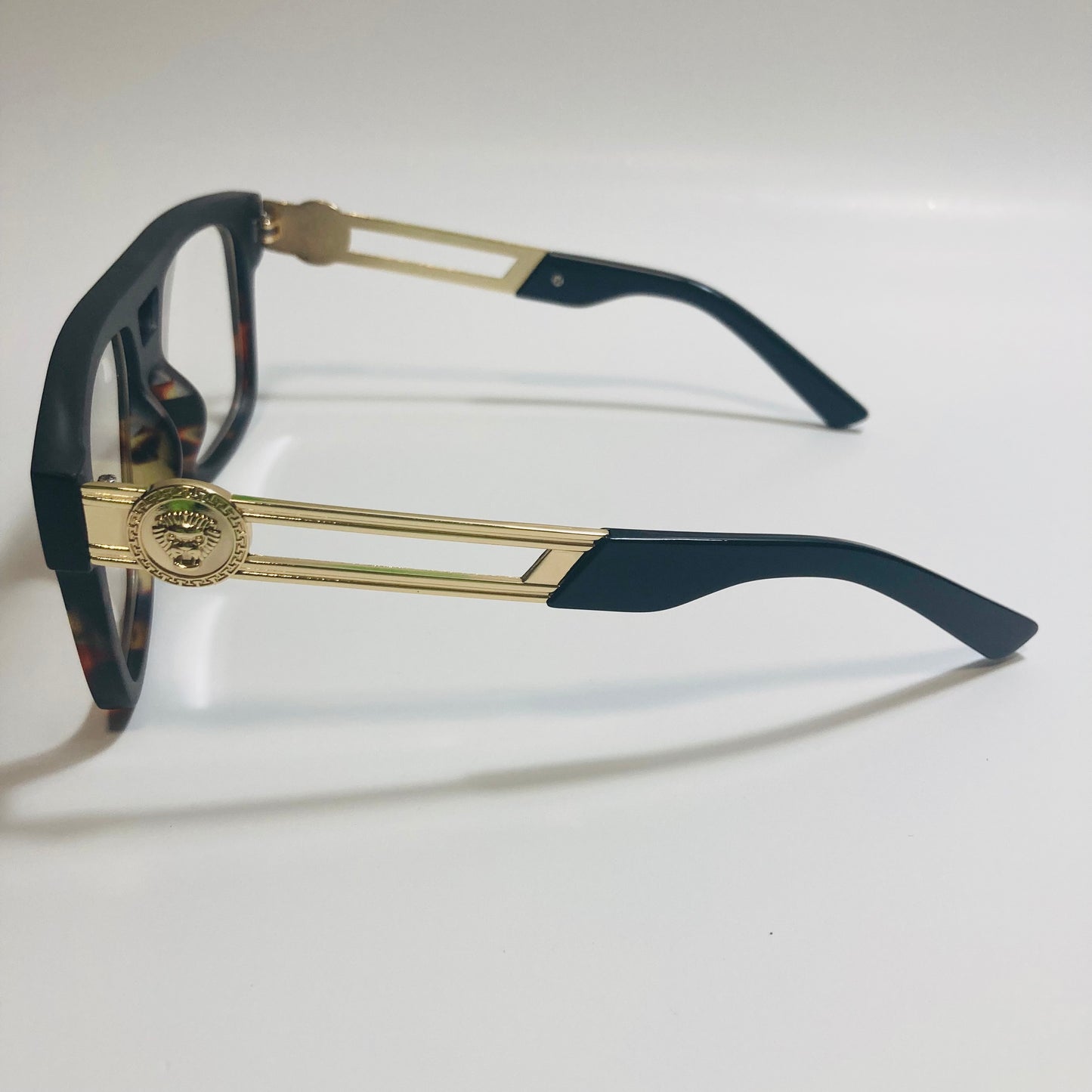 mens and womens black brown and gold fake glasses