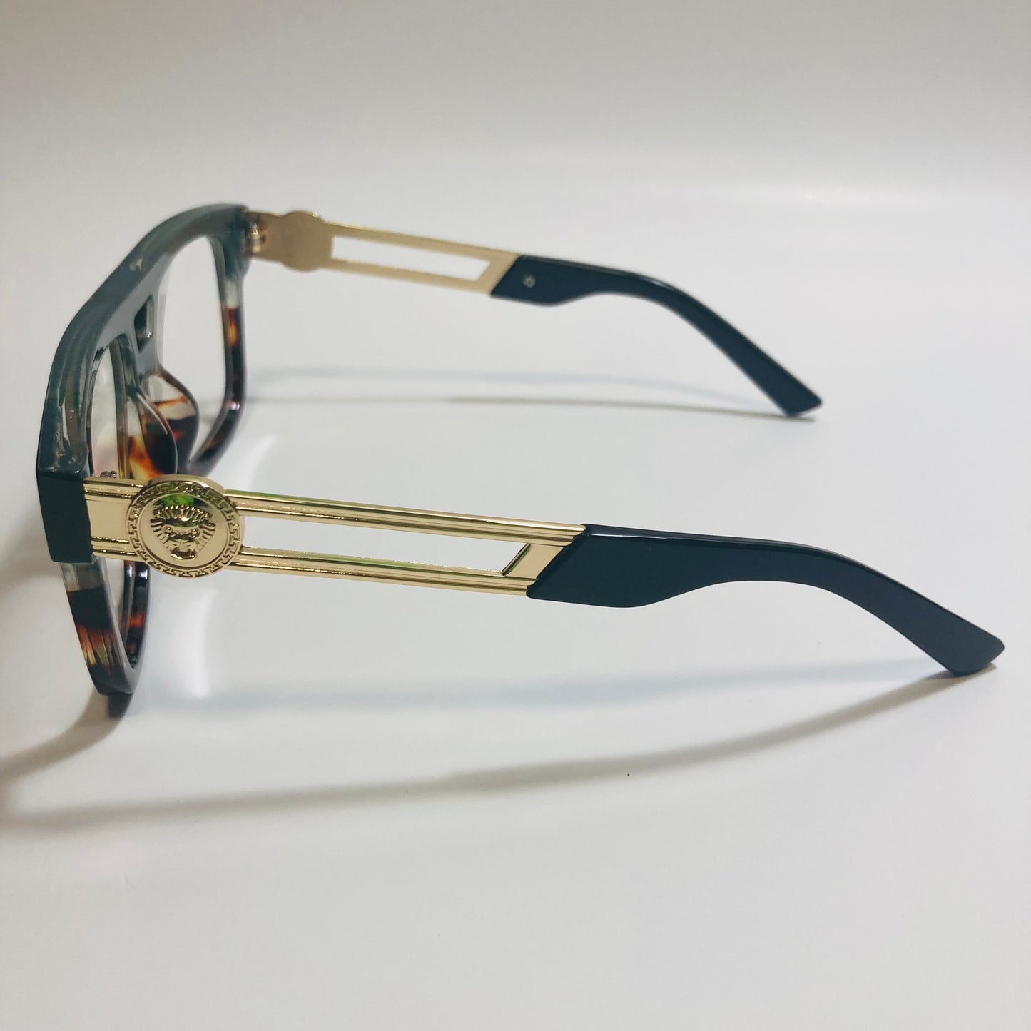 mens and womens black brown and gold fake glasses
