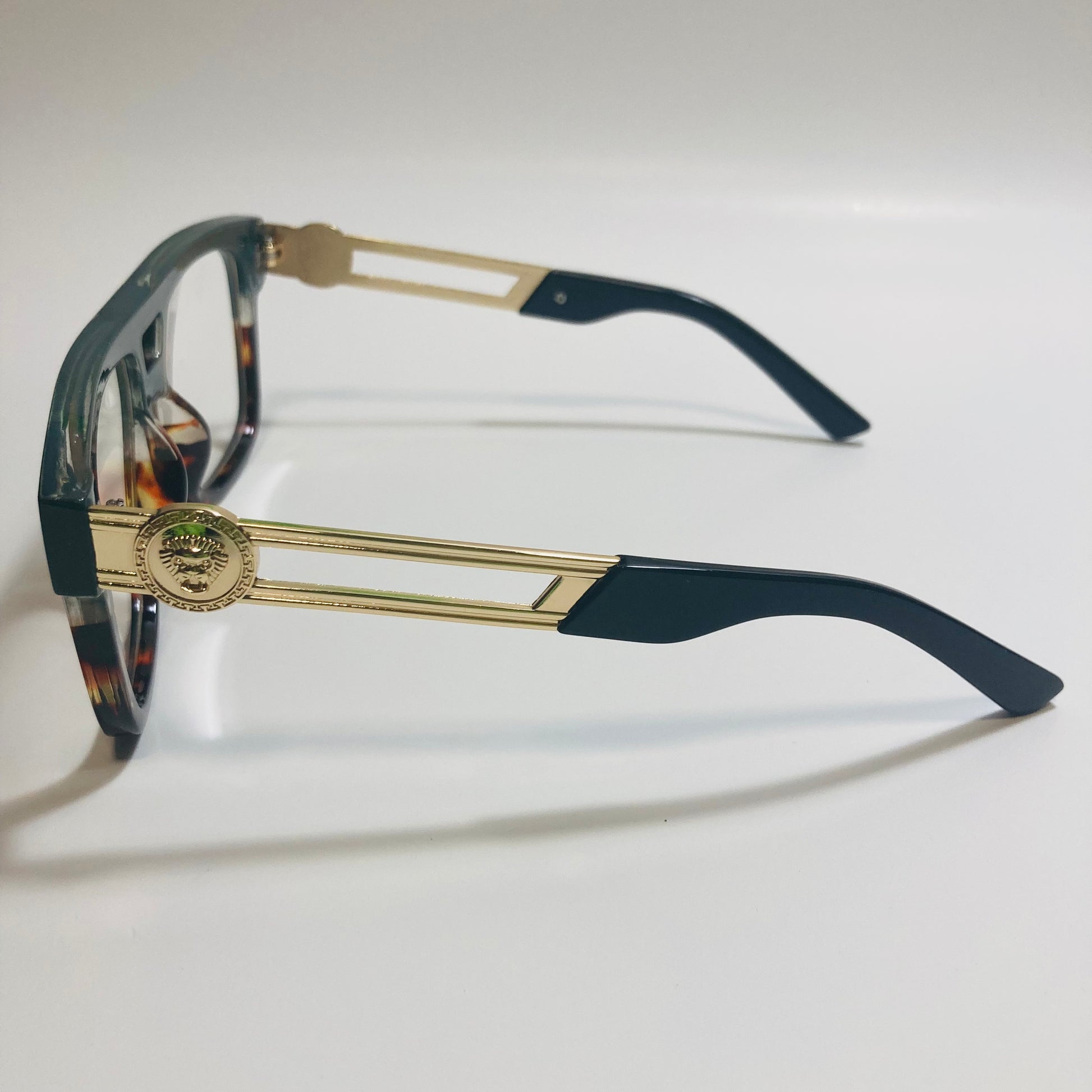 mens and womens black brown and gold fake glasses