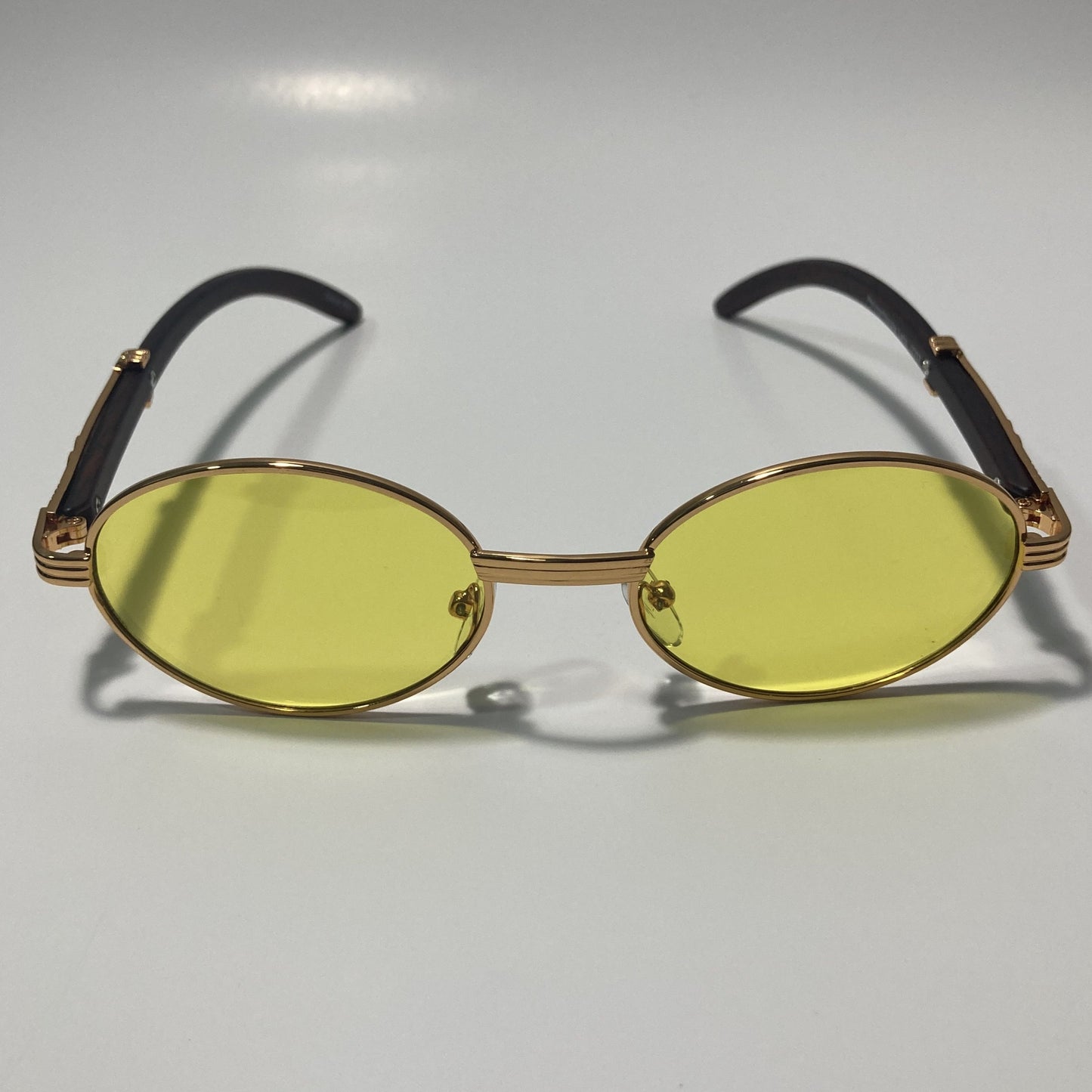 mens and womens yellow and gold round sunglasses