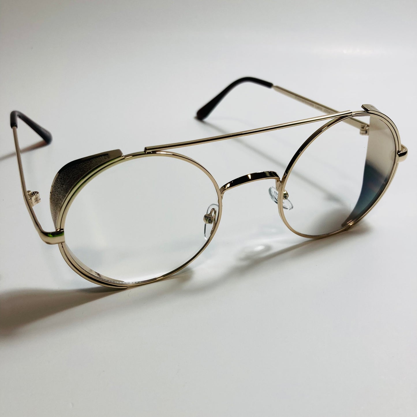 mens and womens white gold round glasses with side shields