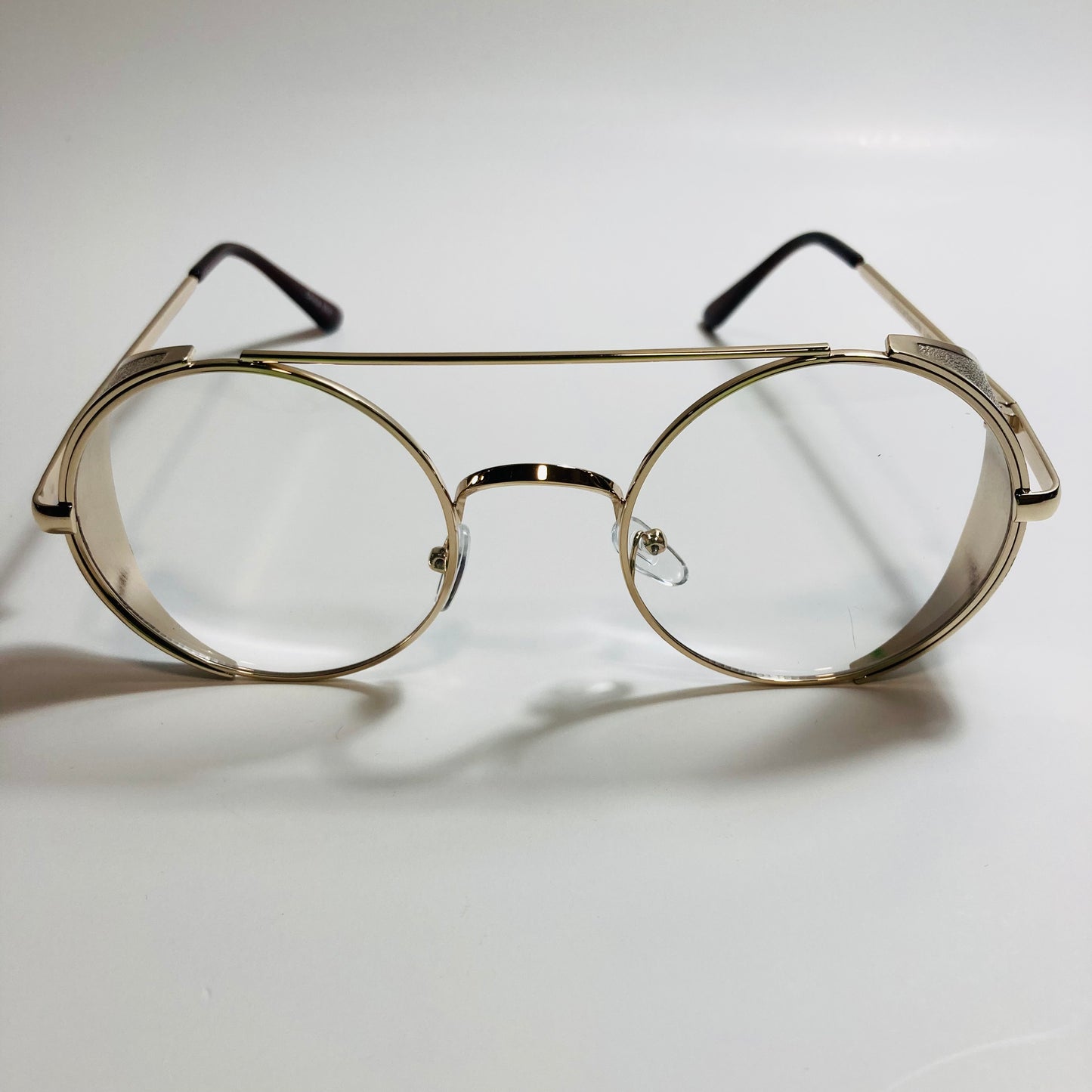 mens and womens white gold round glasses with side shields