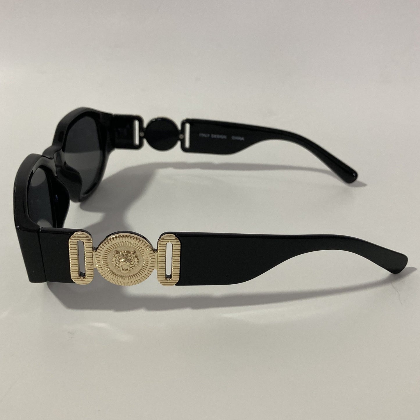 mens and womens black and gold biggie sunglasses