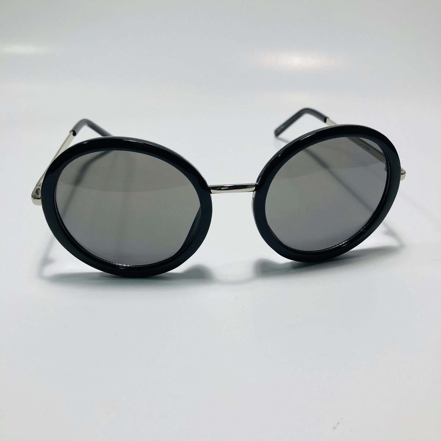 womens black and gray round sunglasses