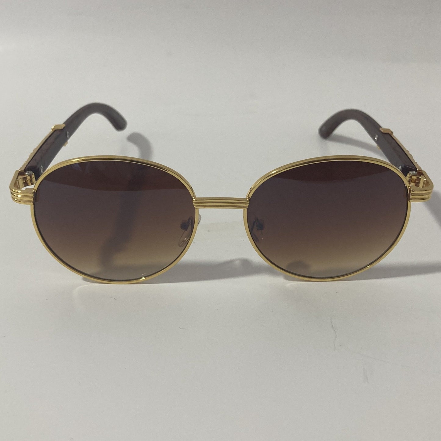 womens and mens gold and brown round sunglasses